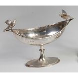 An Edwardian silver pedestal twin handled footed sweetmeat dish,