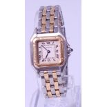 A ladies Cartier bi-metal steel and 18ct gold cased Santos wristwatch, having signed square dial,