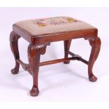 *A George II walnut dressing stool,