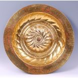 *A 17th century Nuremberg brass alms / offering plate,