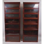 A pair of circa 1910 Globe Wernicke mahogany seven-tier sectional bookcases,