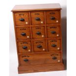 An oak and crossbanded squarefront utility chest,