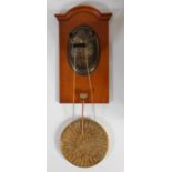 A circa 1900 bronze and oak hanging novelty gong,