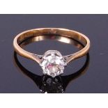 An 18ct gold and platinum diamond solitaire ring, the claw set old cut diamond weighing approx 0.