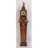 A Louis XV style walnut, boulle and gilt brass floor clock, having eight day striking movement,