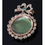 A Victorian silver gilt, emerald and diamond set pendant open locket,