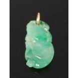 A Chinese celadon jade carved pendant, of naturalistic ovoid form, 8g, 4.