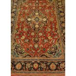 A Persian fineweave woollen rug,