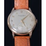 A gents International Watch Company (IWC) 9ct gold cased dress watch, having a signed silvered dial,