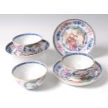 A set of three 19th century Chinese porcelain tea bowls on stands,