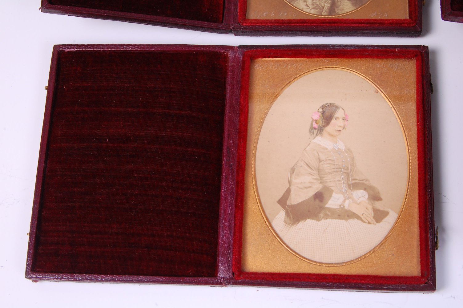 *A Victorian hand-coloured daguerreotype three-quarter length portrait of a lady, - Image 4 of 6