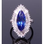 A contemporary 14ct white gold, tanzanite and diamond dress ring, of good size,