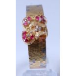A David Shackman contemporary ladies 18ct two-colour gold bracelet watch,