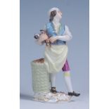 A Meissen porcelain figure 'The Chicken Seller',