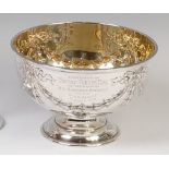 An Edwardian silver footed rose bowl, of circular form, having gilt washed interior,