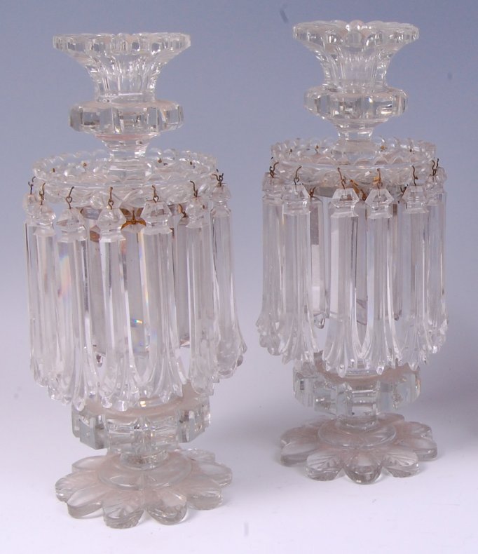 *A pair of late 19th century cut clear glass pedestal lustres,