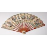 A late 18th century Chinese fan, the ivory sticks stained red and heightened in gilt,
