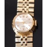 A ladies 18ct gold Rolex Orchid cocktail watch, having a signed silvered dial with baton markers,