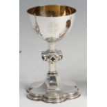 A Victorian Gothic Revival silver footed chalice, having gilt washed interior,