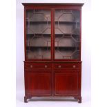 *A pair of 19th century mahogany bookcase cabinets,