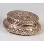 A 19th century Dutch silver table snuff-box, of domed oval form,