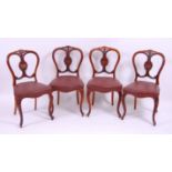 *A set of four late Victorian walnut salon chairs,