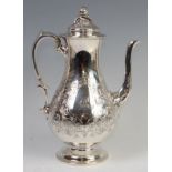 An early Victorian silver pedestal coffee pot, having acorn finial topped hinged dome cover,