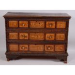 An 18th century Italian carved walnut and marquetry inlaid commode,