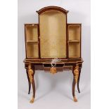 A 19th century French rosewood and ormolu mounted breakfront cabinet on stand,
