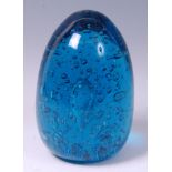 A large Victorian blue glass end-of-day weight, having typical bubble inclusions, h.