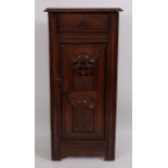 A 19th century carved walnut Flemish marriage cabinet,