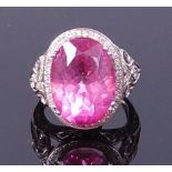 A white metal, pink topaz and diamond set dress ring,