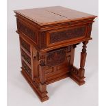 A late Victorian walnut writing davenport, of unusual design,