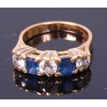 An 18ct gold, sapphire and diamond ring,