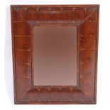 A William & Mary style oyster veneered cushion framed rectangular wall mirror,