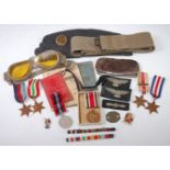 A collection of WW II and later medals and effects to include 1939-45 Star, France and Germany Star,