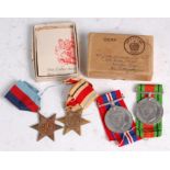 A WW II group of four to include 1939-45 Star, Africa Star, Defence and War,