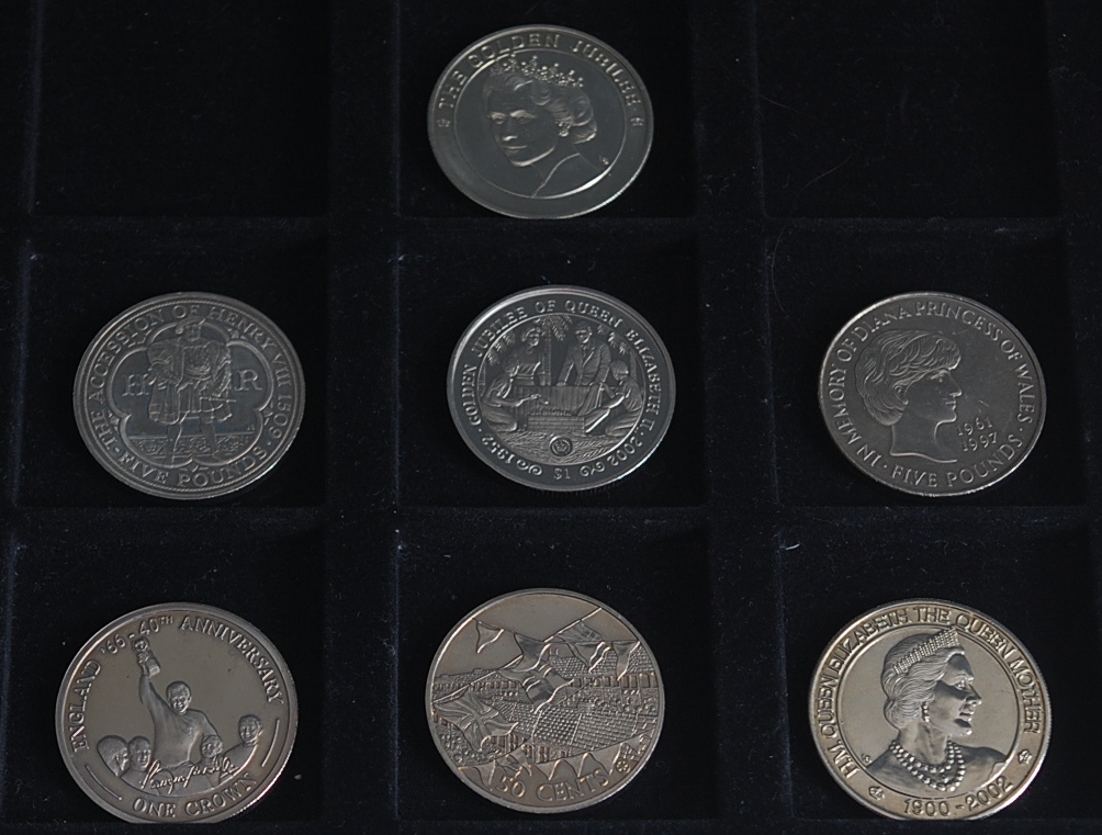 Seven various commemorative crowns, to include; 2002 Sierra Leone dollar,