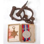 A WW II 1939-45 Star and War medal in original O.H.M.S.