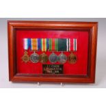 A family group of medals to include WW I 1914-15 Star, naming B. 3655. J.C. CURTIS. SMN. . R.N.R.