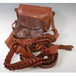 A Brady brown leather cartridge bag on a canvas strap,