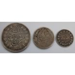 Three Middle Eastern silver coins, to include; Afghanistan 5 rupee and 50 rupee,