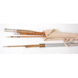 An H.L. Leonard USA Tournament 9' three piece split cane trout fly rod, with spare tip in tube.