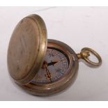 A WW I Dennison VI nickel cased compass, dated 1918, 4.5cm.