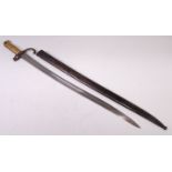 A French model 1866 Chassepot bayonet, having a 57cm singled edged fullered Yataghan shaped blade,