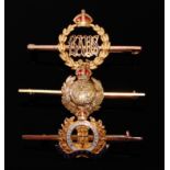 A Suffolk Regiment 9ct gold and enamelled bar brooch,