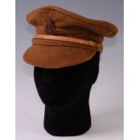 A British Army trench cap with Royal Bucks Hussars badge.