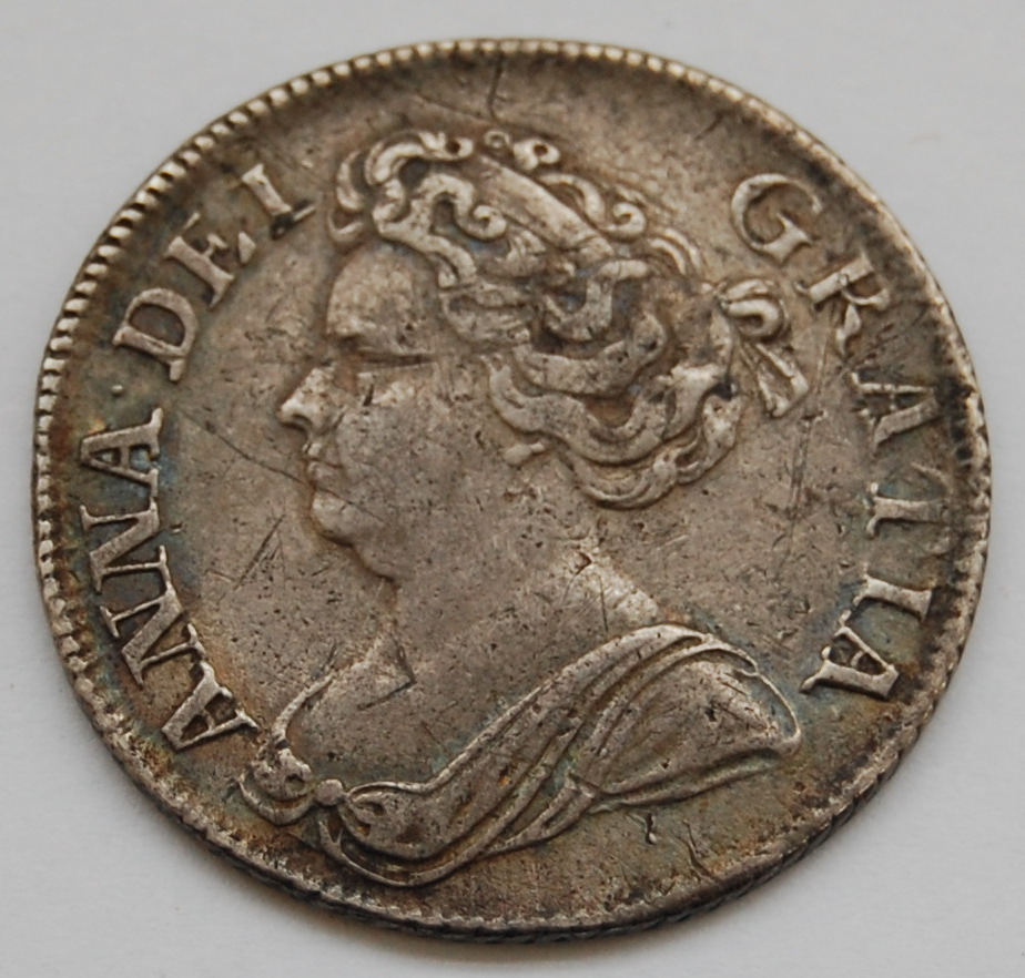 Great Britain, 1711 shilling, Queen Anne laureate and draped fourth bust, rev.