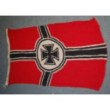 A German Kriegsmarine cotton battle flag, stamped to the border Reichskriegsflag and dated 1943,