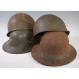 A WW II M44 Brodie helmet with remains of liner,